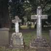 View of rustic crosses, gravestone dedicated to Donald Stewart d. 1919, Old Blair, St Bride's burial ground.