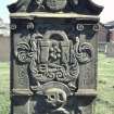 Perth, Greyfriars Burial Ground. Reverse face of gravestone, trade emblems of the Perth Glovers.