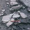 Primary (pre-houses) paving in Trench II outside S wall of House 1, Knap of Howar, during excavation.