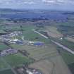 Oblique aerial view centred on T in the Park at Balado Bridge airfield, taken from the WNW.