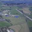 Oblique aerial view centred on T in the Park at Balado Bridge airfield, taken from the WNW.