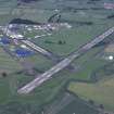 Oblique aerial view centred on T in the Park at Balado Bridge airfield, taken from the SW.