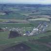 Oblique aerial view centred on T in the Park at Balado Bridge airfield, taken from the N.