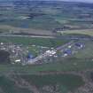 Oblique aerial view centred on T in the Park at Balado Bridge airfield, taken from the NNW.