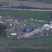 Oblique aerial view centred on T in the Park at Balado Bridge airfield, taken from the NNW.