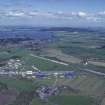 Oblique aerial view centred on T in the Park at Balado Bridge airfield, taken from the NW.