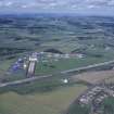 Oblique aerial view centred on T in the Park at Balado Bridge airfield, taken from the SSW.