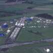 Oblique aerial view centred on T in the Park at Balado Bridge airfield, taken from the S.