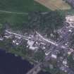 Oblique aerial view centred on the town of Dunkeld with road bridge and cathedral adjacent, taken from the SE.