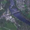 Oblique aerial view centred on the town of Dunkeld with road bridge and cathedral adjacent, taken from the WNW.