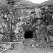 View of portal showing tunnel and floor of plant house